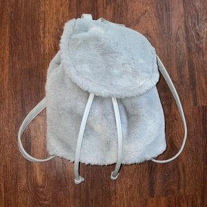 Gray furry book bag